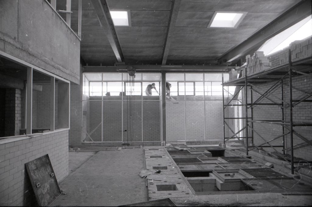 The inside of a pump building under construction at a Water Board construction site, October 1969