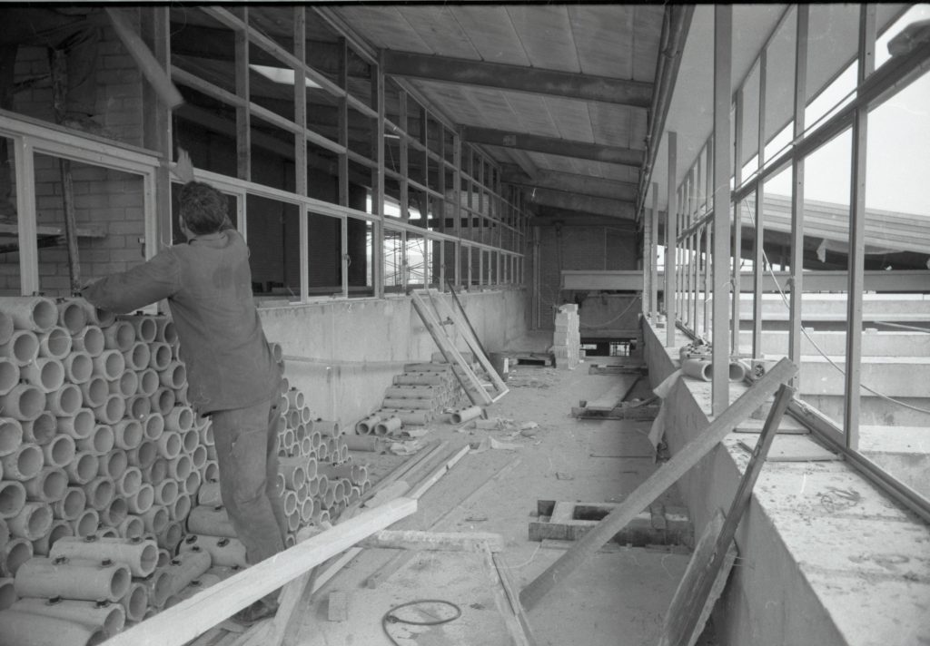 Workers building infrastructure to house pumps and inner workings at a Water Board Construction site October 1969
